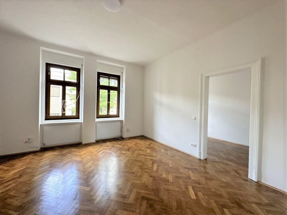 PROVISIONSFREI – Sanierte 2-Zimmer-Altbauwohnung mit separater Küche und Balkon gegenüber der TU Graz