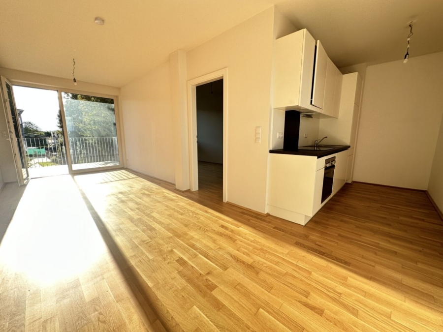 Perfekt aufgeteilte, sonnige 2-Zimmer-Wohnung mit Balkon und KFZ-Abstellplatz in einem modernen Neubau – Provisionsfrei - Bild